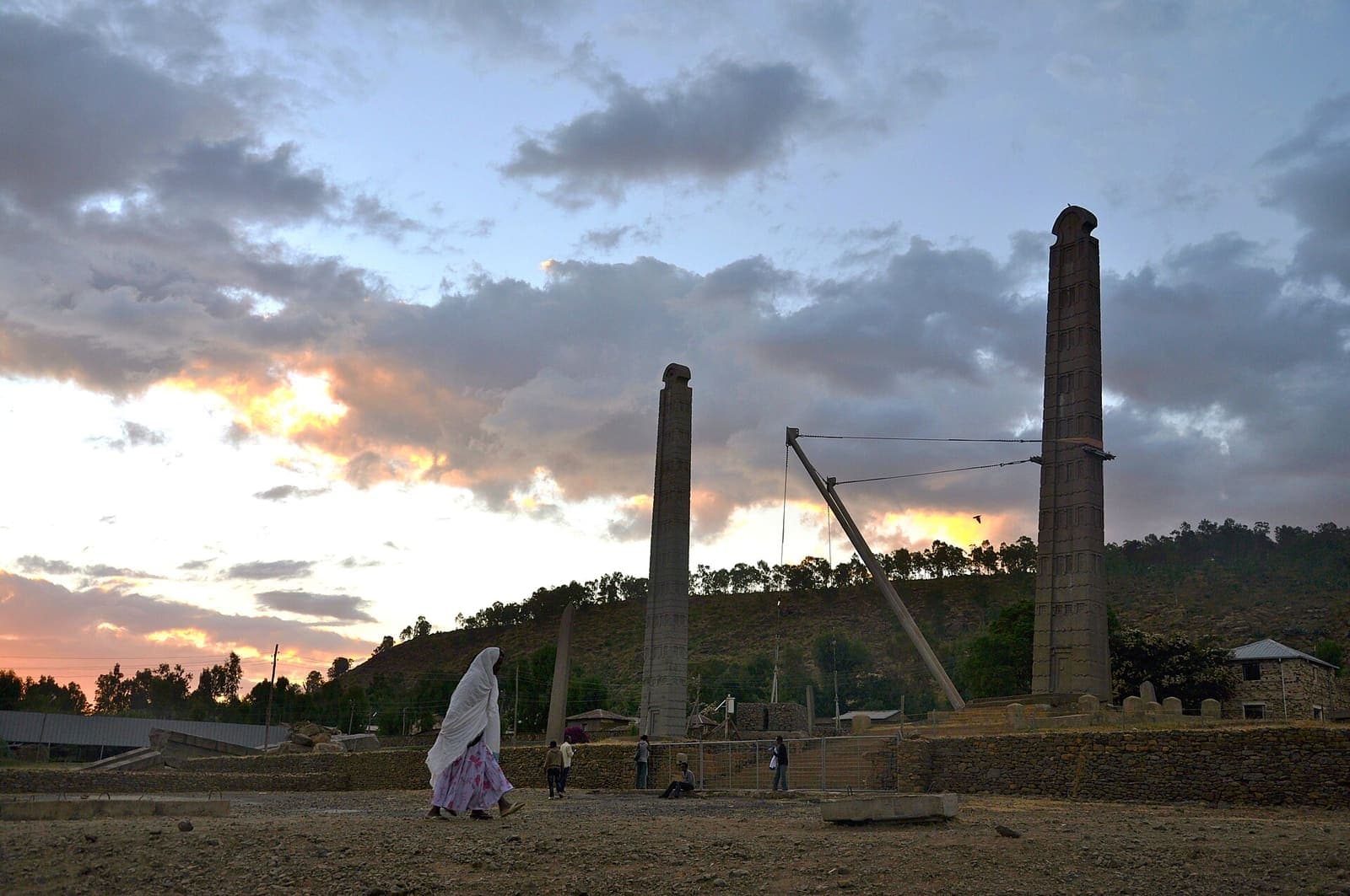 Tall carved stone obelisks standing in a park at Aksum.